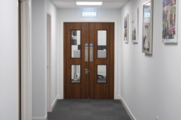 A fire doorset with clear signage, showing compliance with fire safety regulations.