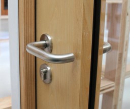 Close-up of a Gerda multiperformance flat entrance doorset with fire-resistant materials.