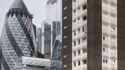 A view of modern apartment buildings designed under updated safety regulations.